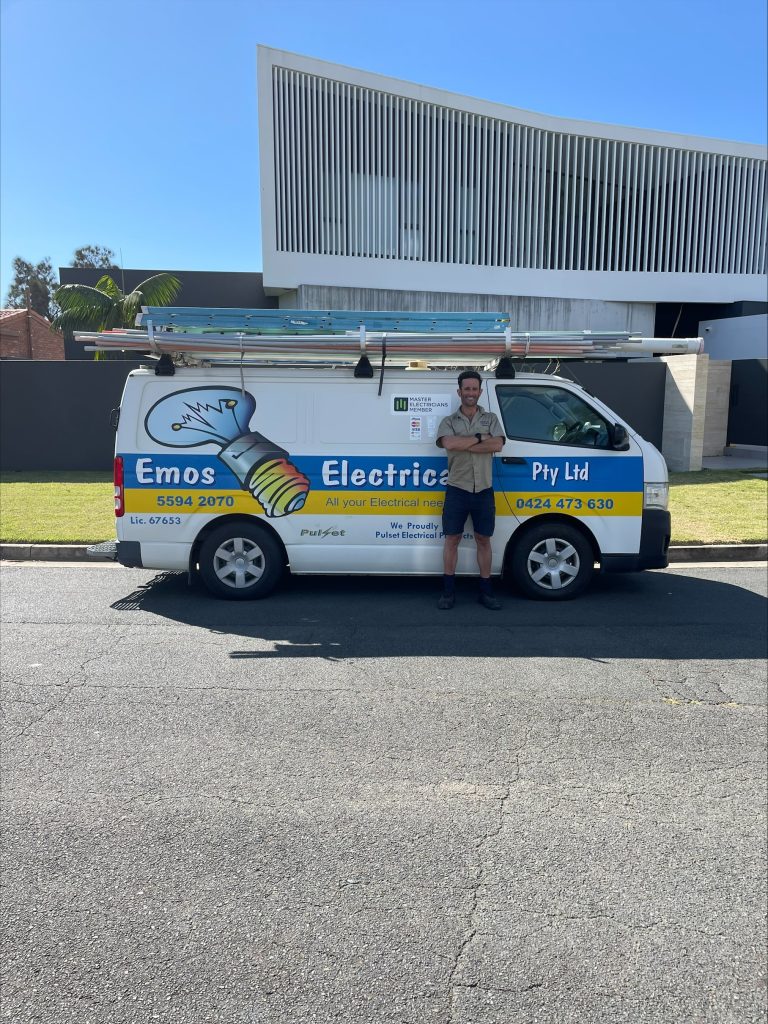 michael in front of emos electrical vehicle